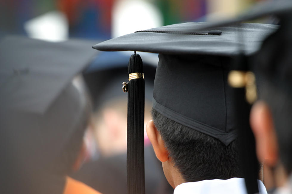 A Student Tries and Fails to Do a Backflip at His Graduation