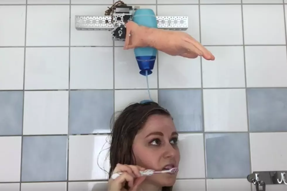 Homemade Robot Washes a Woman&#8217;s Hair, Badly