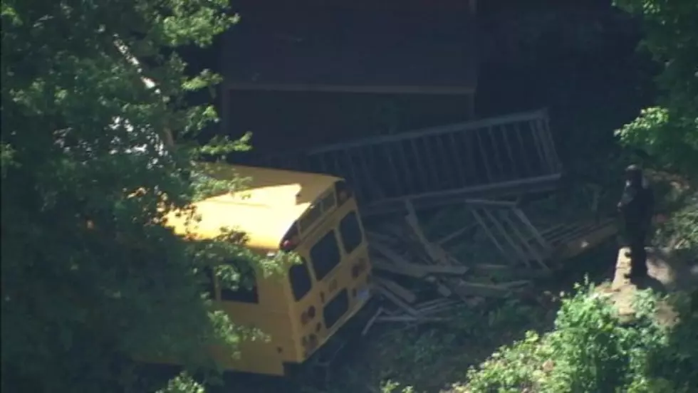 School Bus Crashes into House After Driver Swerves to Miss Cat