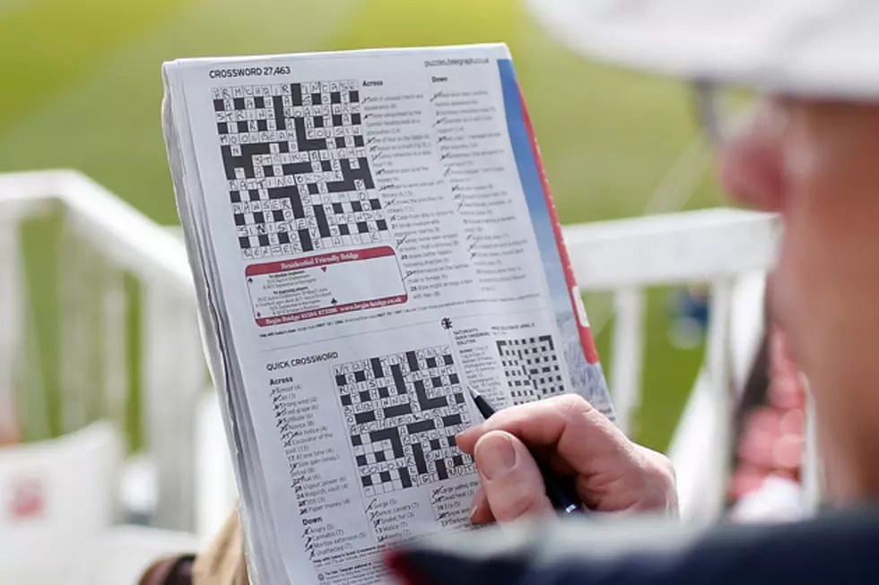 Elderly German Woman Fills In Crossword Puzzle Art at Museum