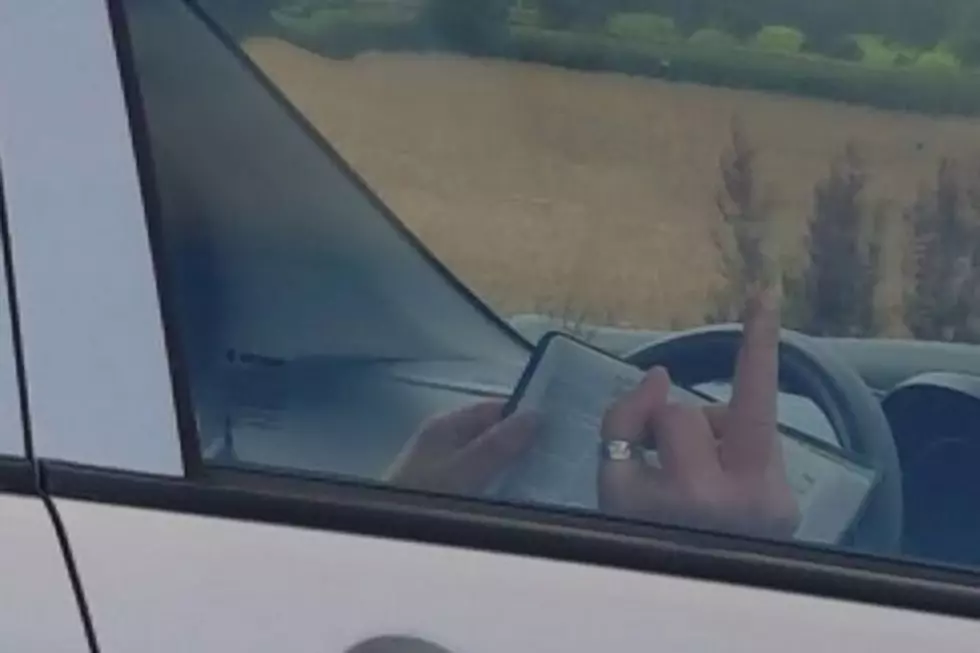 Woman Reads Bible While Driving, Flips Off Motorists