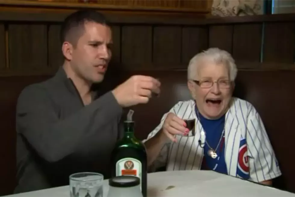 Elderly Cubs Fans Does Shots with News Anchor Post-NLCS