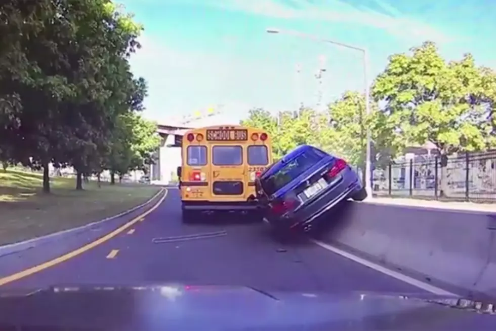 Impatient BMW Driver Receives Instant Karma While Passing School Bus