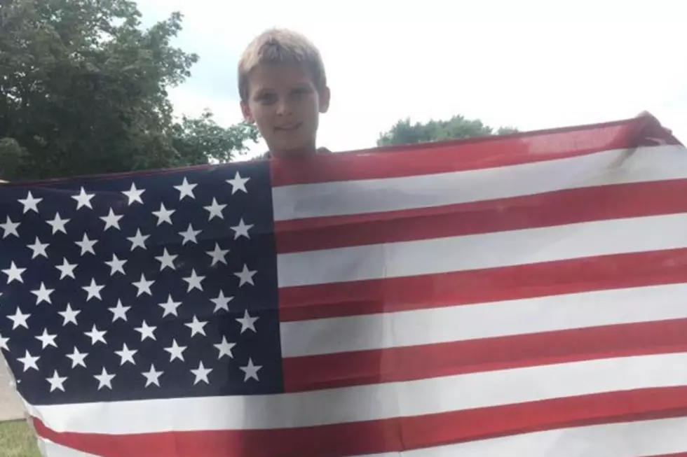 Moline Preteen On a Mission to Replace Tattered American Flags