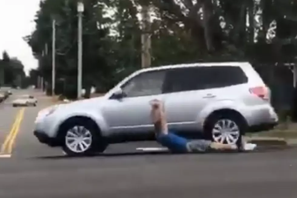 Video Shows Carjacker Hanging Onto Door Handle and Getting Dragged Down a Street