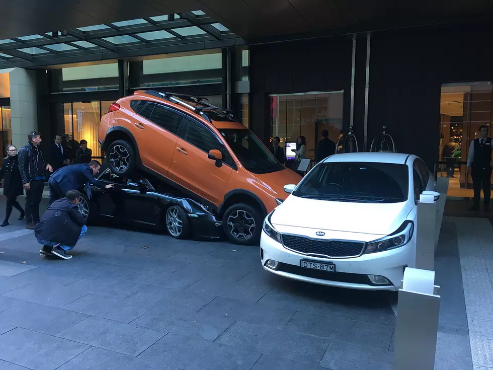Hotel Valet Needs Rescue After Driving Porsche Under SUV