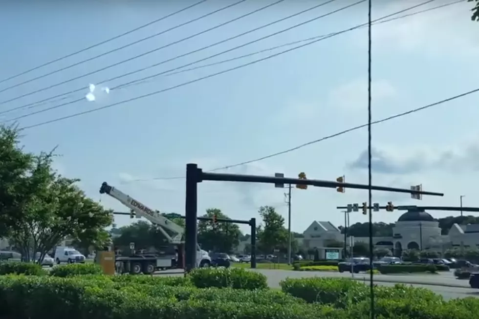Oblivious Crane Driver Wreaks Havoc on an Intersection