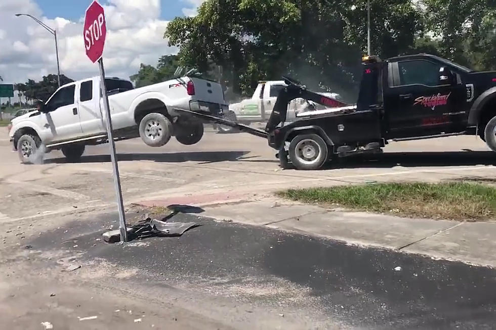 Repossessed Pickup Has Tug-Of-War With Tow Truck