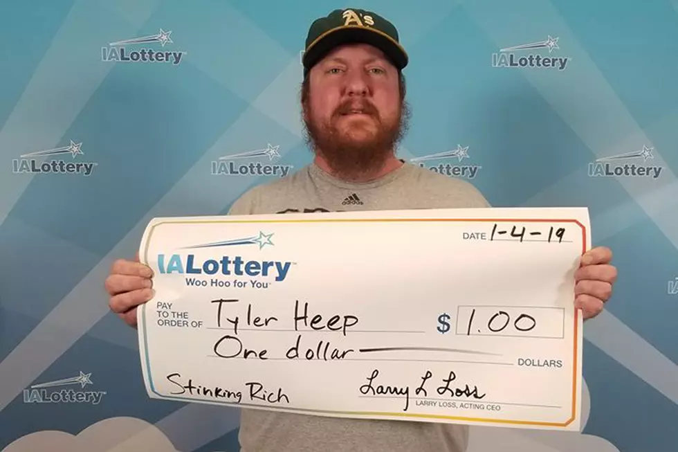 Iowa Man Receives Giant Check For $1 Lottery Win