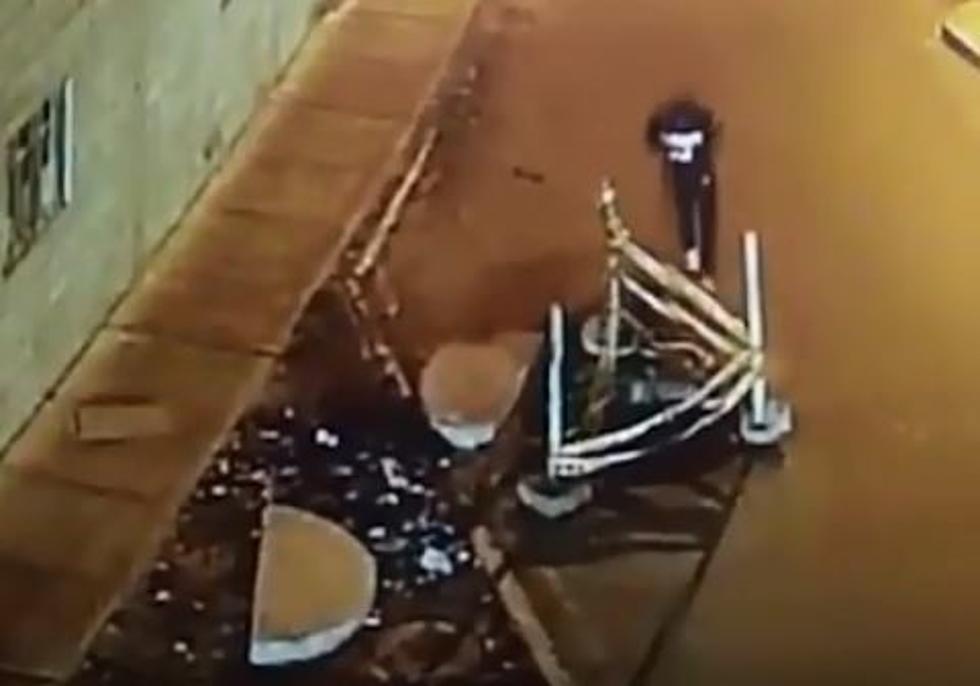 Guy Walking and Texting Falls Down a Manhole