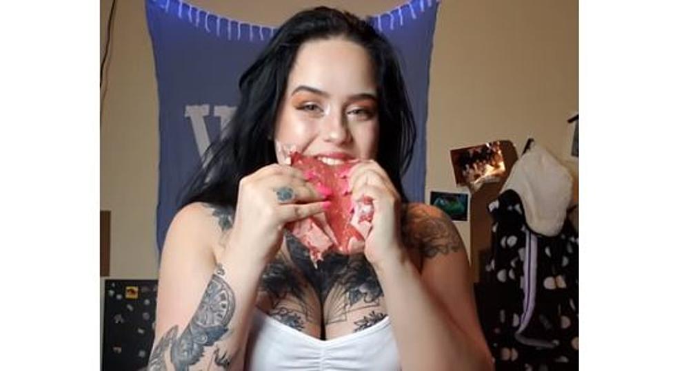 Woman Eats a Raw Ribeye Steak Shaped Like a Valentine’s Day Heart