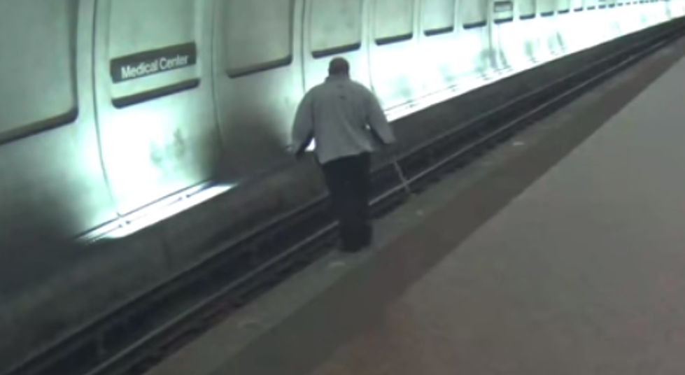 Blind Man Falls onto Train Tracks, Random People Save Him Just in Time