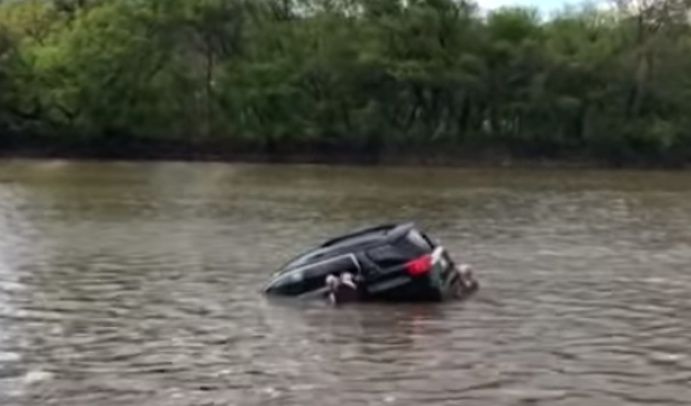Bystanders Rescue a Woman From a Sinking Car