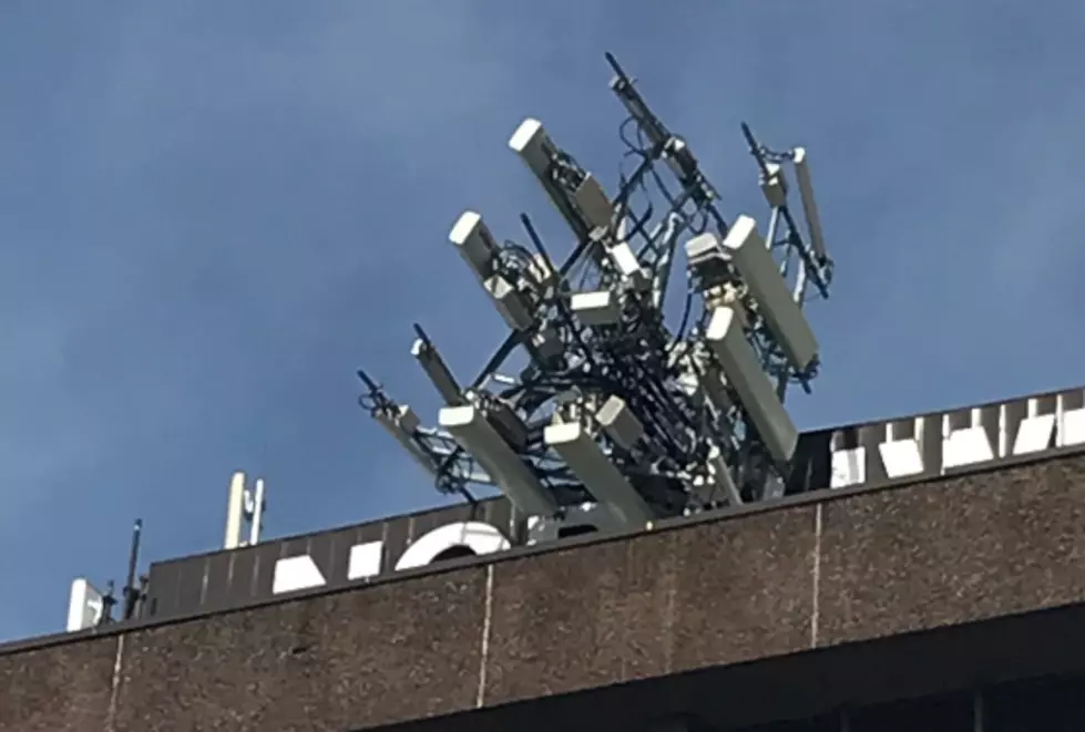 Cell Phone Tower Collapses on top Of Northwest Bank Building