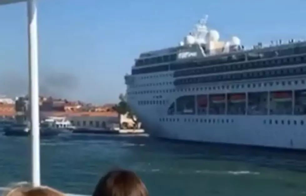 Massive Cruise Ship Plows Into a Riverboat and the Dock