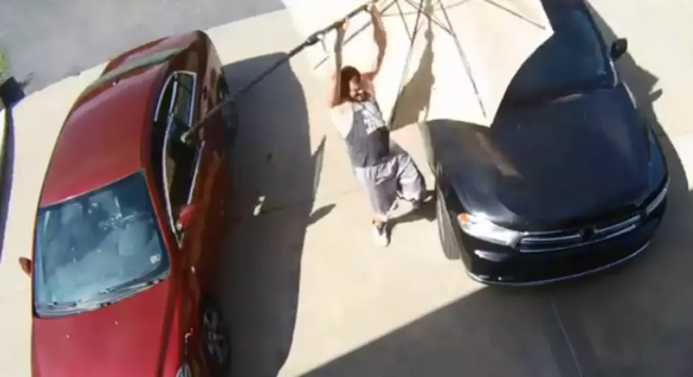 Man Catches a Flying Patio Umbrella Headed for His Car