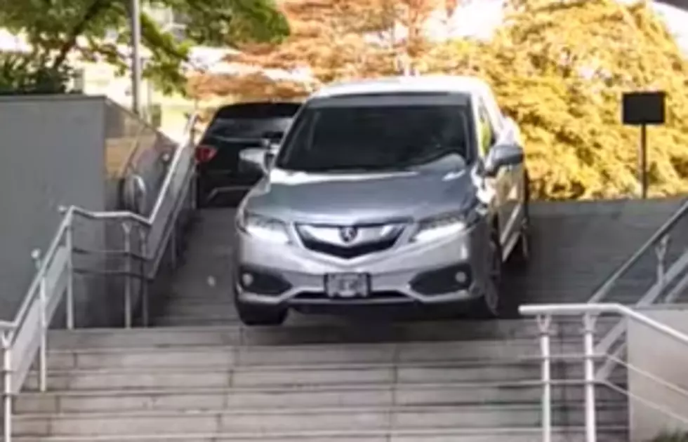 Woman Drives Her Car Down Concrete Steps