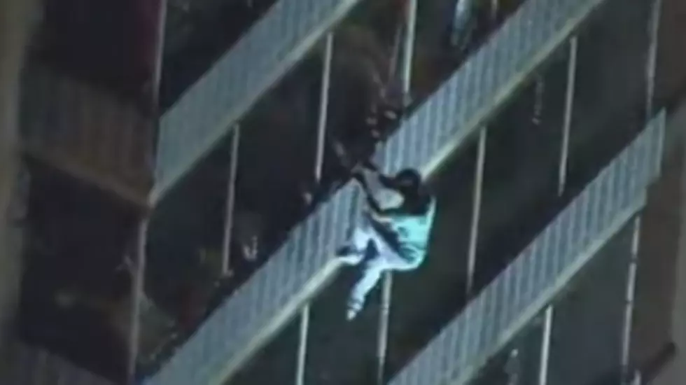 Man Scales a 15-Story Building to Save His Mom From a Fire