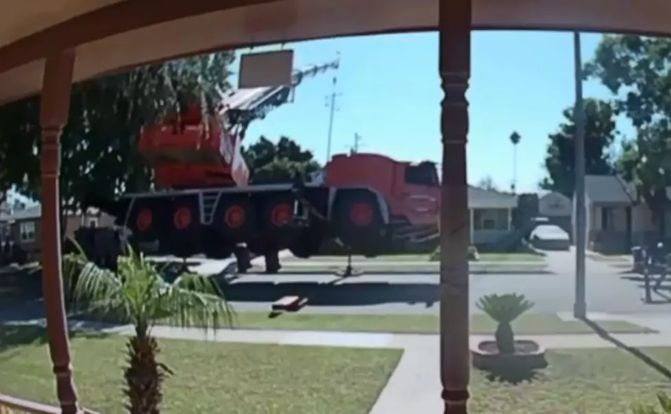Surveillance Video Shows Crane Collapse On Houses