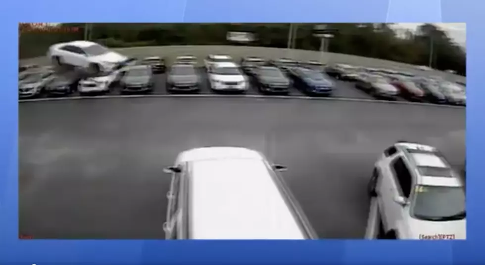 Car Launches Over Dealership Cars, Hits Two