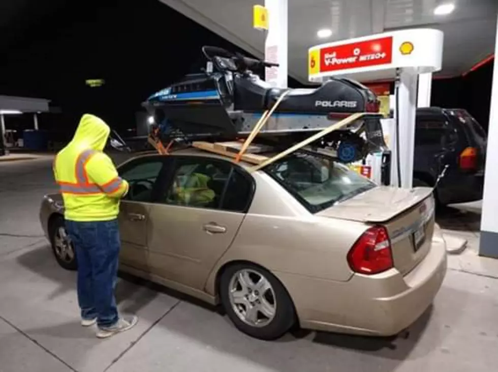 Man Puts Snowmobile on Top of Chevy Malibu, Drives From Chicago to Wisconsin