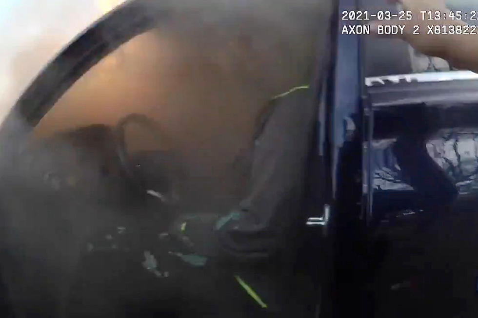Bodycam Footage Shows Police Rescue Man From Burning Car
