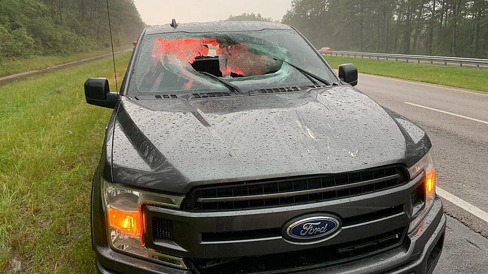 Lightning Strikes Pavement, Sends It Flying Through Truck