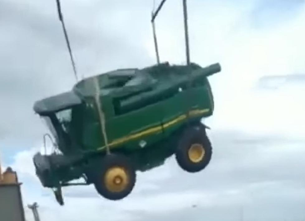 WATCH: New John Deere Combine Falls About 40 Feet From A Crane