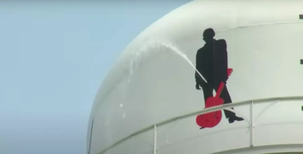 Johnny Cash Peeing Gallons Off Top Of A Water Tower
