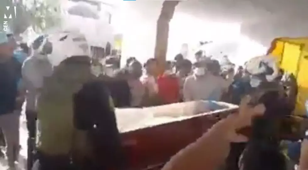 &#8216;Dead&#8217; Woman Bangs on Coffin To Let Everyone Know She&#8217;s Still Alive