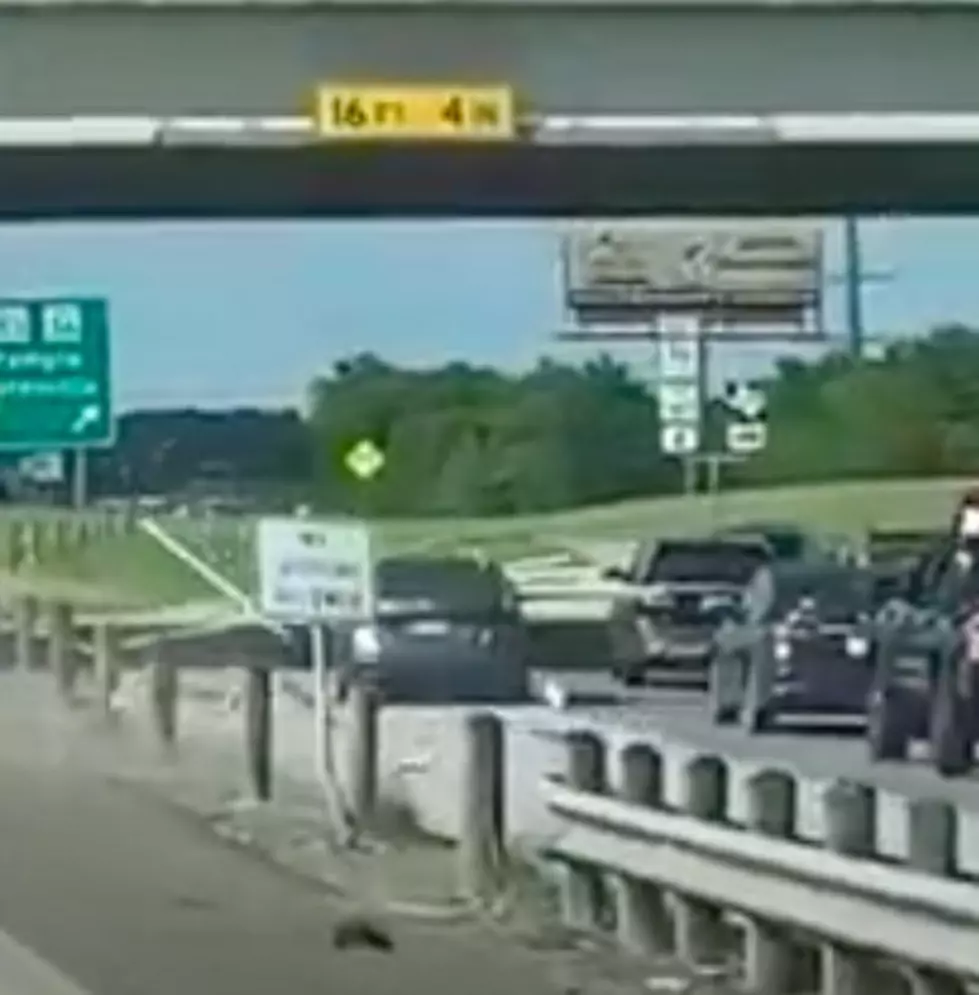 Small Car Carrying Large Wood Planks Causes Accident [VIDEO]