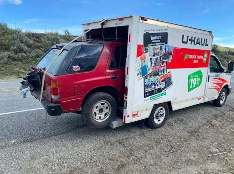 U-Haul Spotted Driving Down The Road With SUV Hanging Out The Back