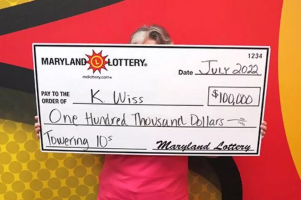 Woman went to visit her mother, bought a lottery ticket and won two pairs of $50,000
