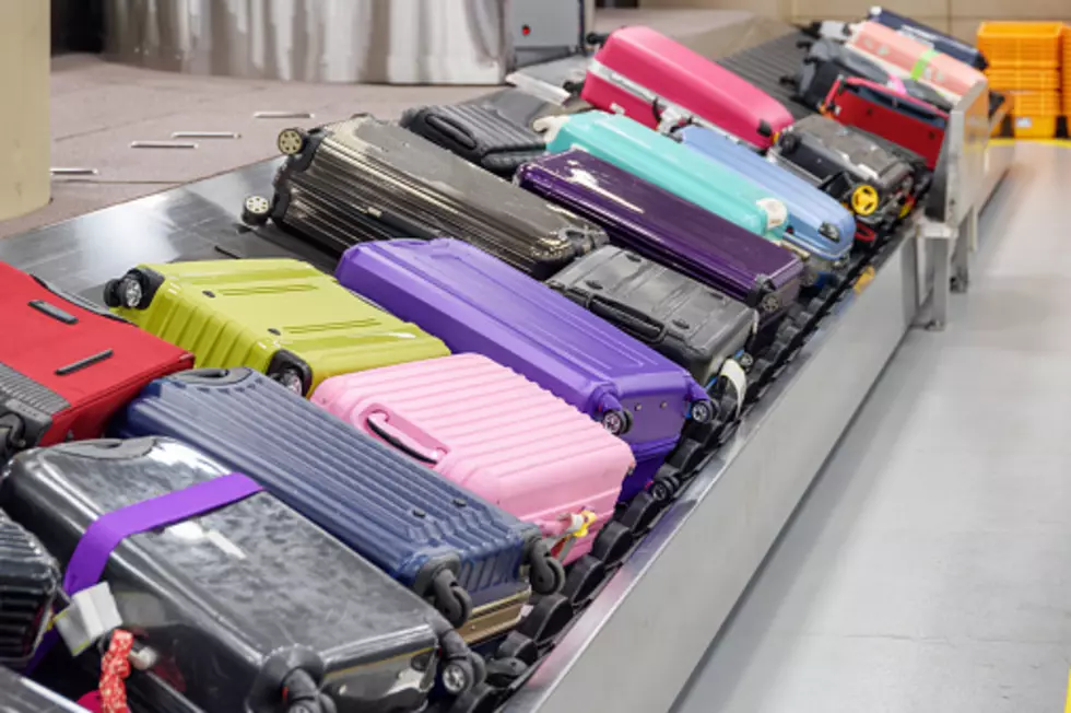 Work Shortage Causes Airline Executives to Work Baggage Claim