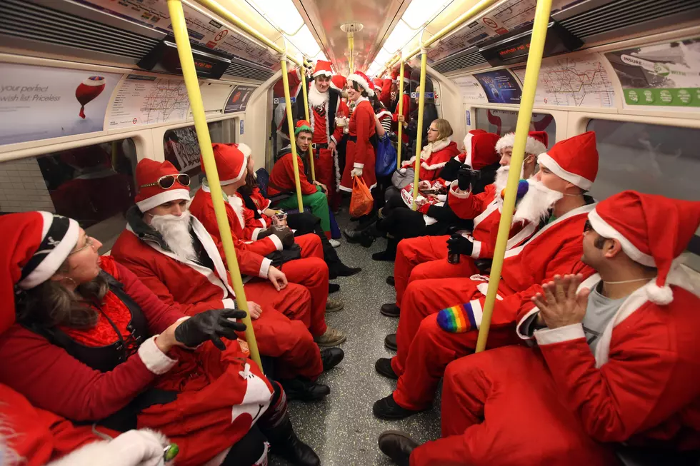 Londoners Dress Up As Santa For "SantaCon" Pub Crawl