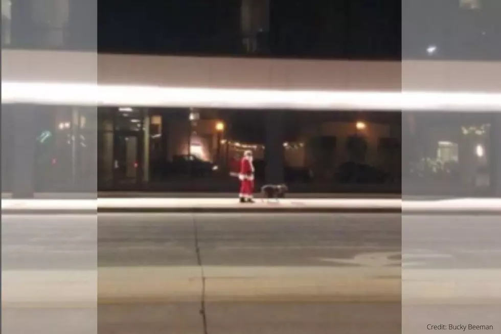 Santa Caught On Video Walking His Dog in Downtown Rochester