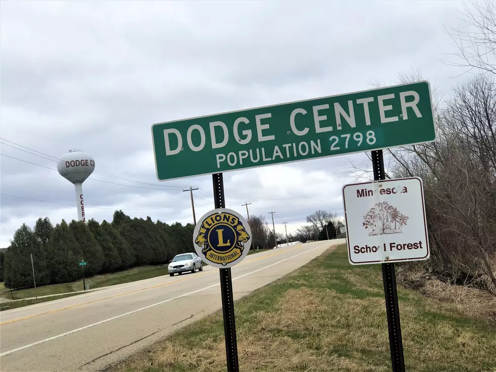 Photo of Dodge Center city limits sign with dodge center water tower in background