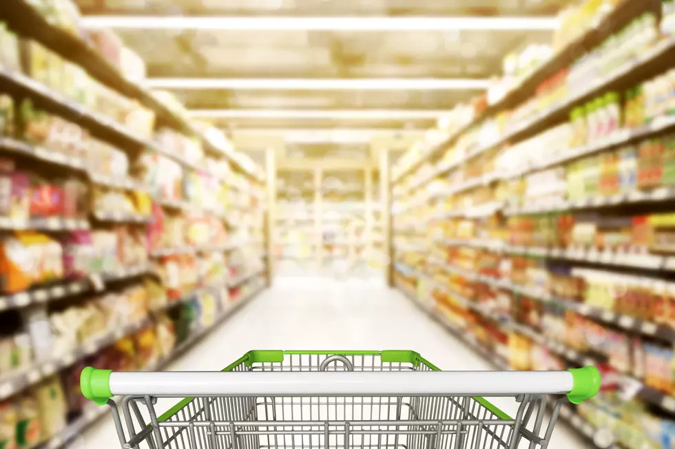 Abstract blurred photo of store with trolley in department store bokeh background