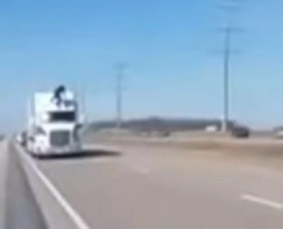 Watch Man Jump on Semi on I-94 to Avoid Getting Arrested by Minnesota State Patrol