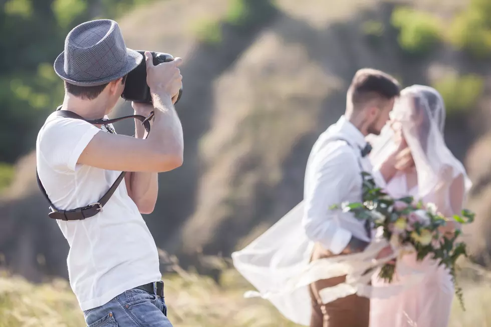 Wedding Photographer Shoves Stepmom Away to Take a Photo [VIDEO]