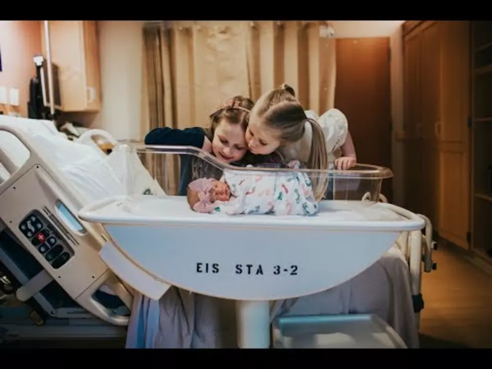 Rochester Couple Shares Beautiful Video of Newborn Baby Meeting Her Sisters For 1st Time