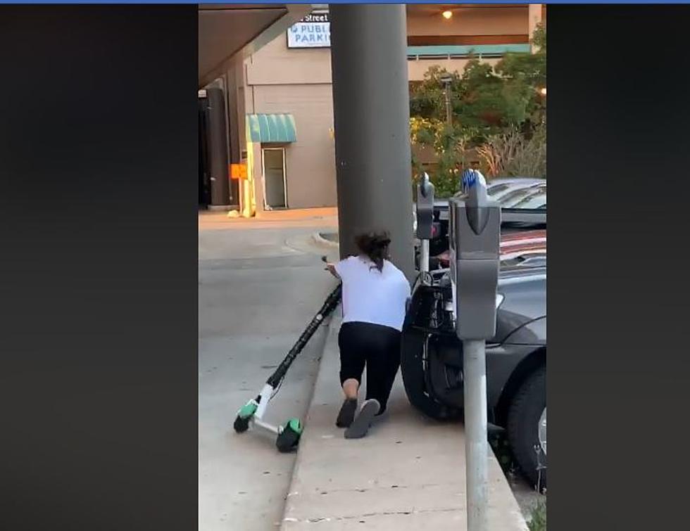 Watch Woman Wipe Out on Lime Scooter in Downtown Rochester