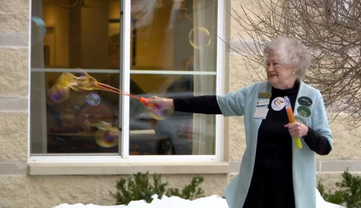 Why This Rochester Woman Blows Bubbles Outside Her House Every Day