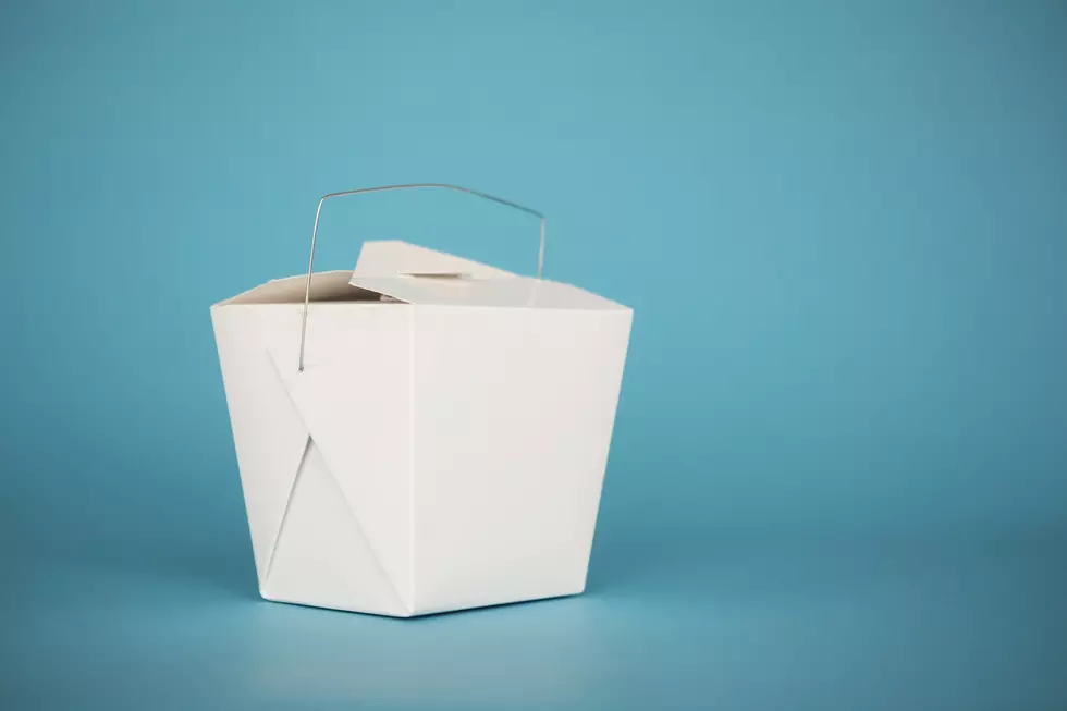 White take out box on a blue background