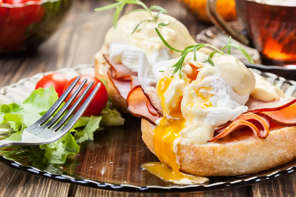Eggs Benedict on toasted muffins with ham