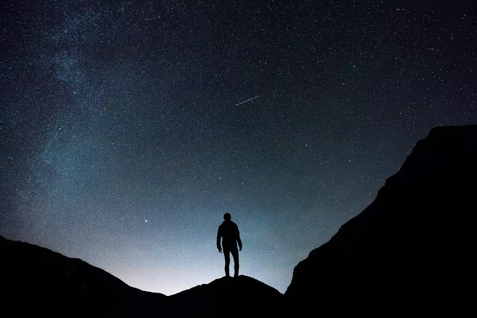 a person staring at the night sky