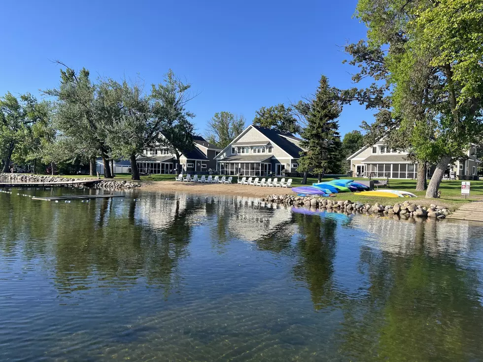 cabins at lake darling resort looking at the beach and lake darling in minnesota