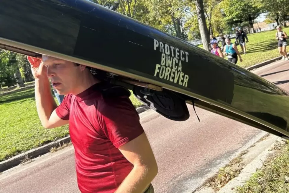 Why a MN Man Portaged a Canoe Through the Twin Cities Marathon
