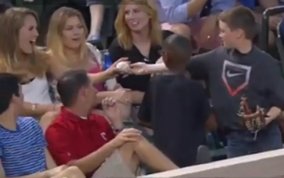 Kid Catches Ball At MLB Game, Then Gives It Away &#8212; Or Does He?