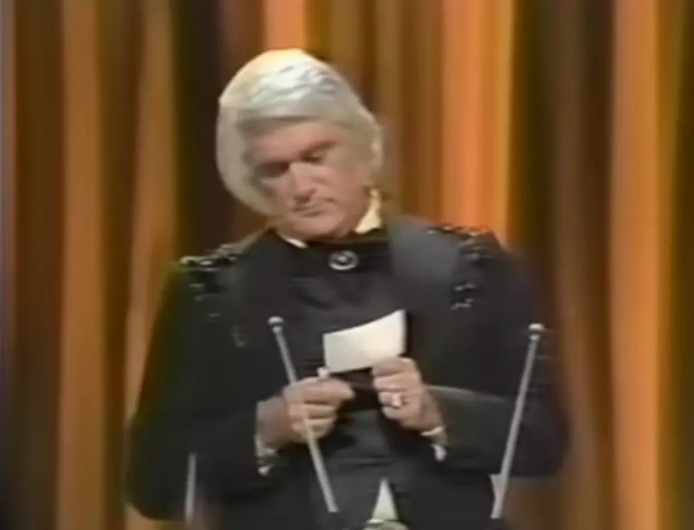CMA Flashback: Charlie Rich Sets ‘Entertainer Of The Year’ Card On Fire